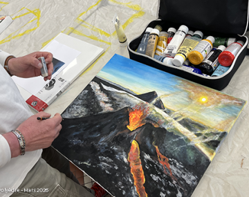 main qui peint un tableau d'un volcan polyèdre seynod annecy